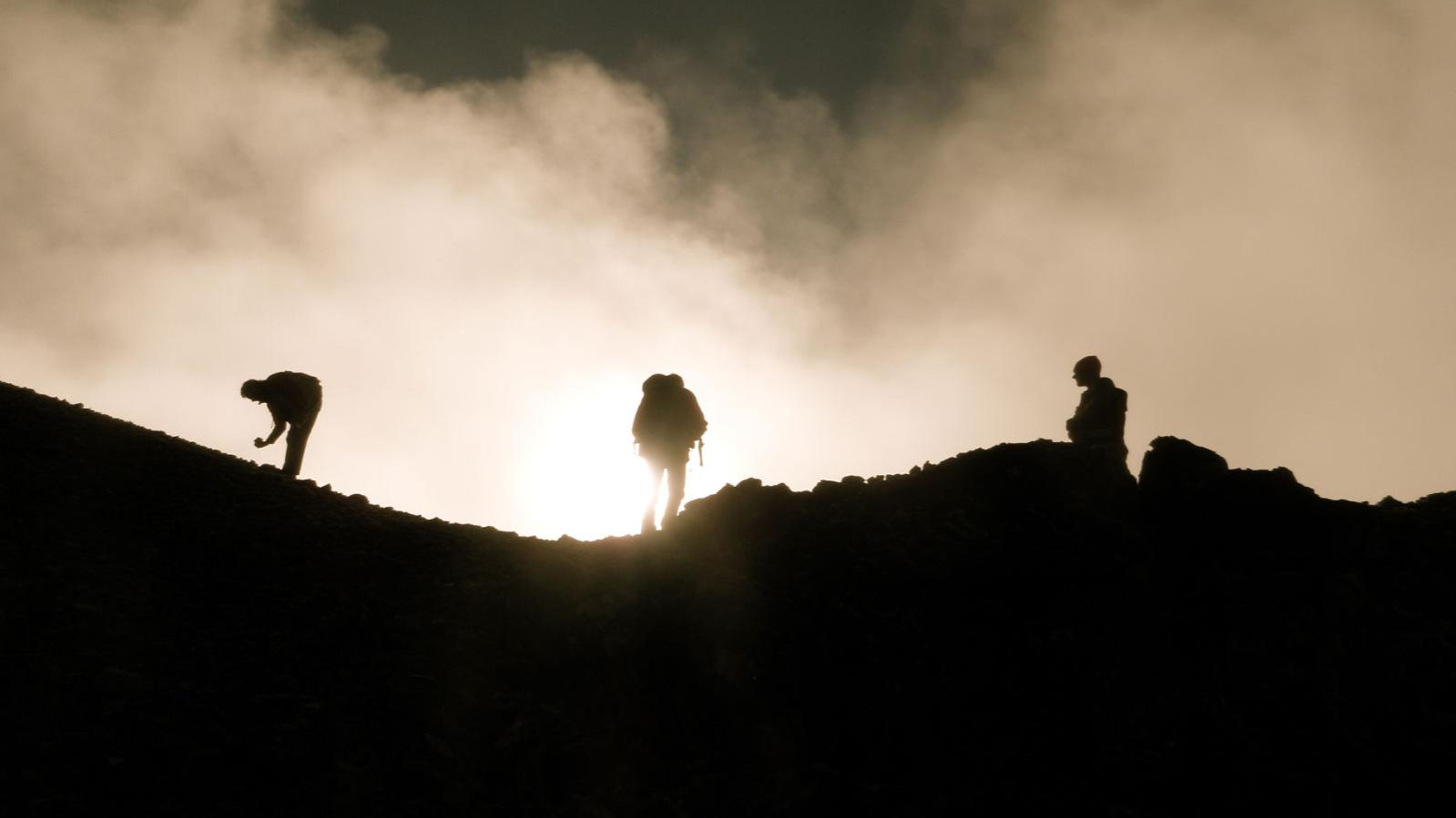 Exploration Geologists in the Field - Kalum Property - Hat Zone - Sampling on a misty ridge Exploration Geologists in the Field - Kalum Property - Hat Zone - Sampling on a misty ridge