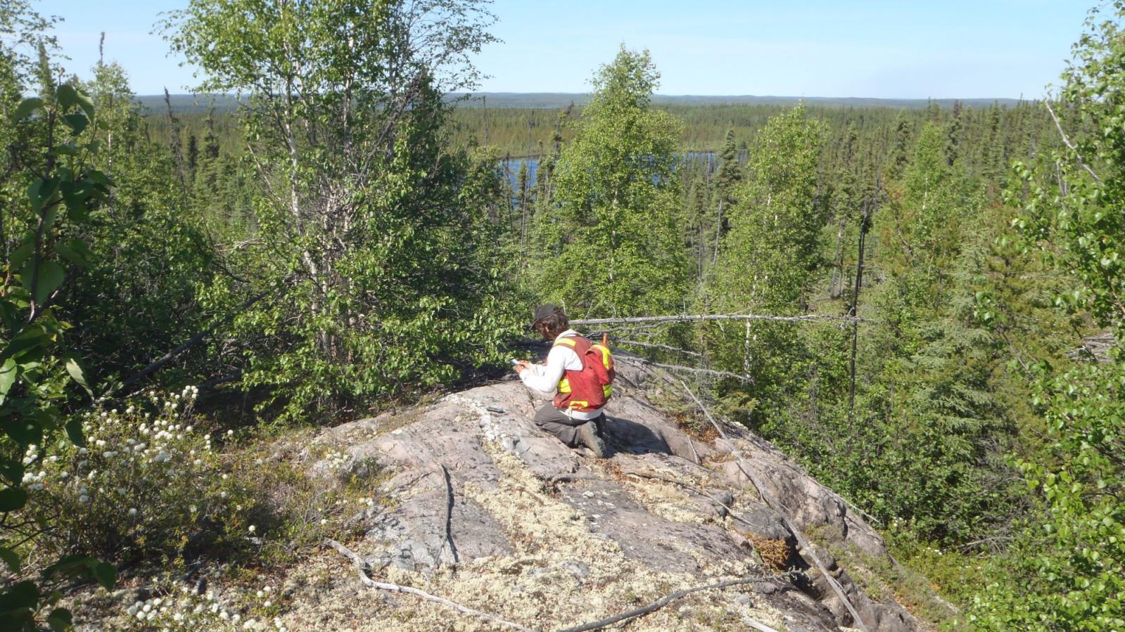 Geologist Exploring for Uranium on Traverse in Saskatchewan