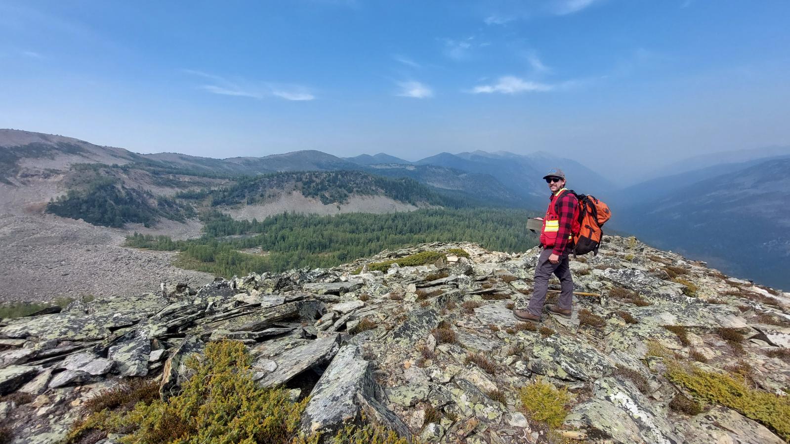 Geologist at the Findlay Property Geologist on a ridge top of the Findlay Property in southeast BC