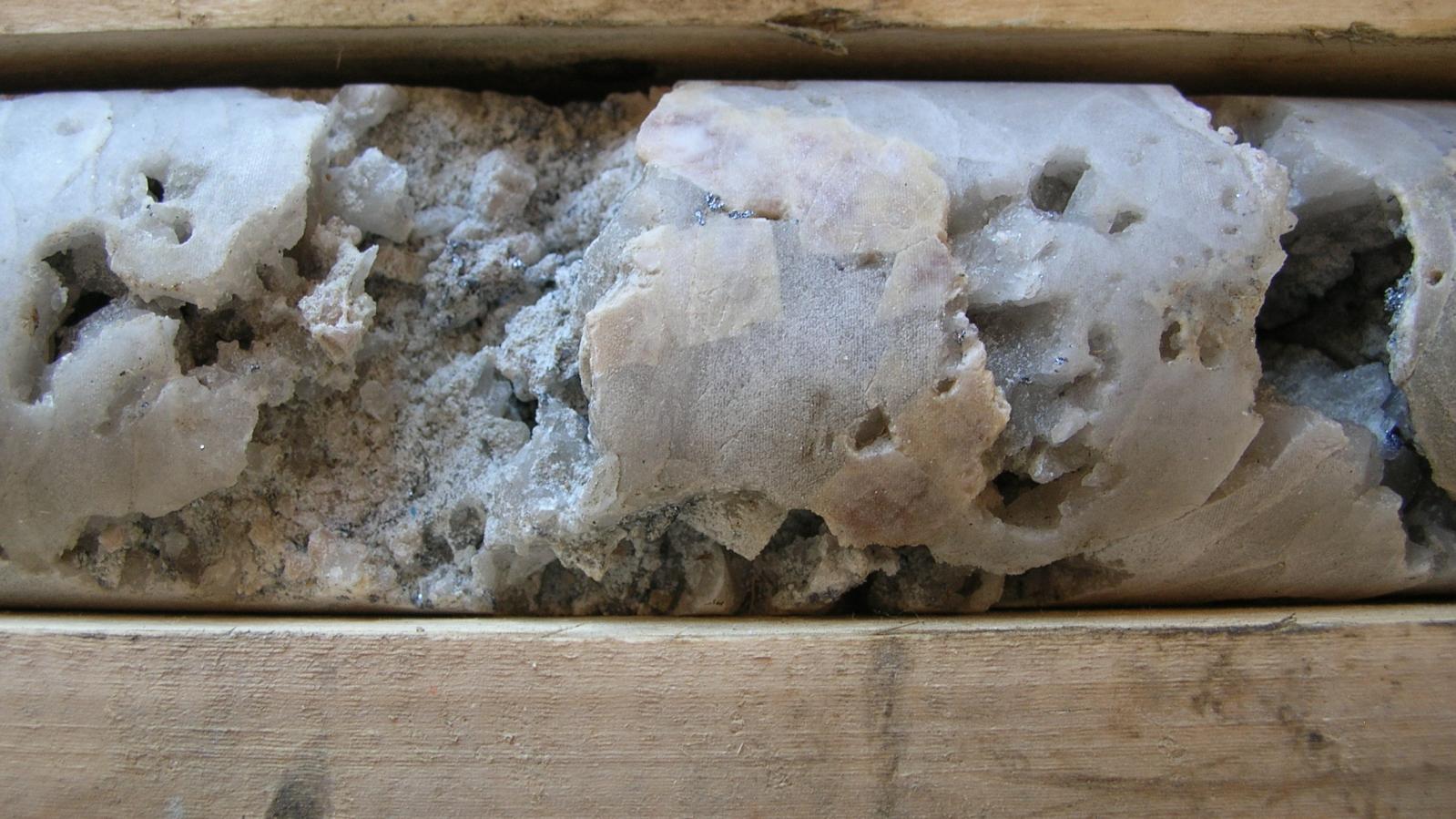 Drill core with the molybdenum mineralization washed out during the drilling process at the Sphinx Molybdenum Project in Southeastern British Columbia 2009