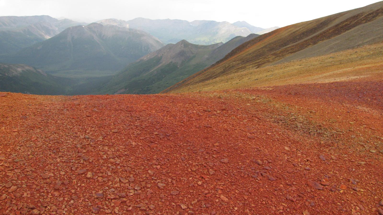 Gossanous Ridge (Trachyte Dome with mineralized volcanic breccia) Gossanous Ridge (Trachyte Dome with mineralized volcanic breccia)