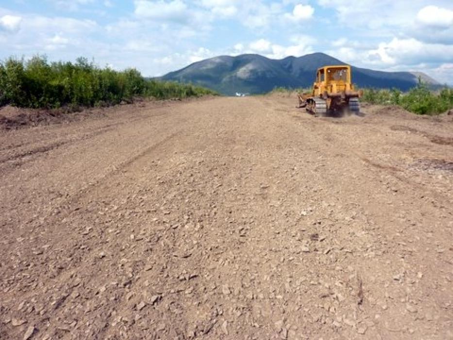 Reclaiming an Airstrip wtih a Caterpillar at the Rusty Springs Critical Metals Exploration Project in the Yukon