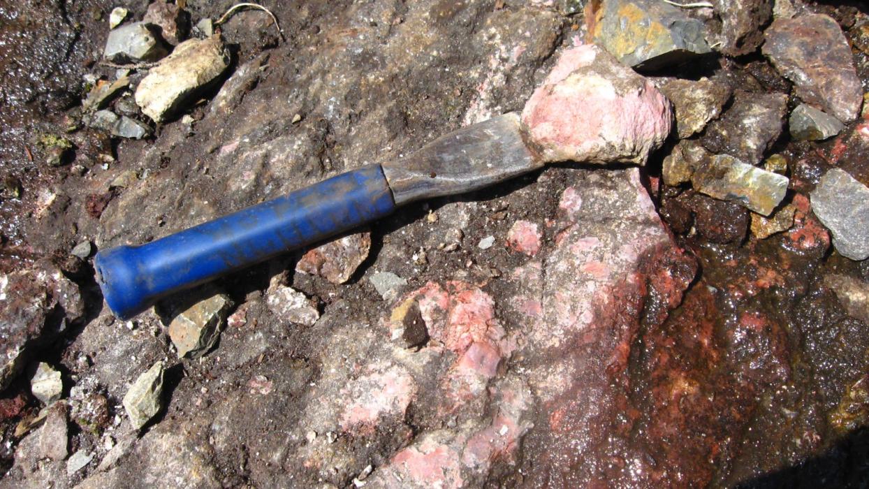 Channel sampling high grade Total Rare Earth Oxices at the REE Buttress Peak Anomaly of the Ice River Complex Project