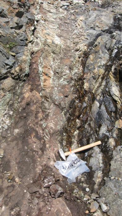 Channel sampling high grade Total Rare Earth Oxide at the REE Buttress Peak Anomaly - Ice River Complex Project