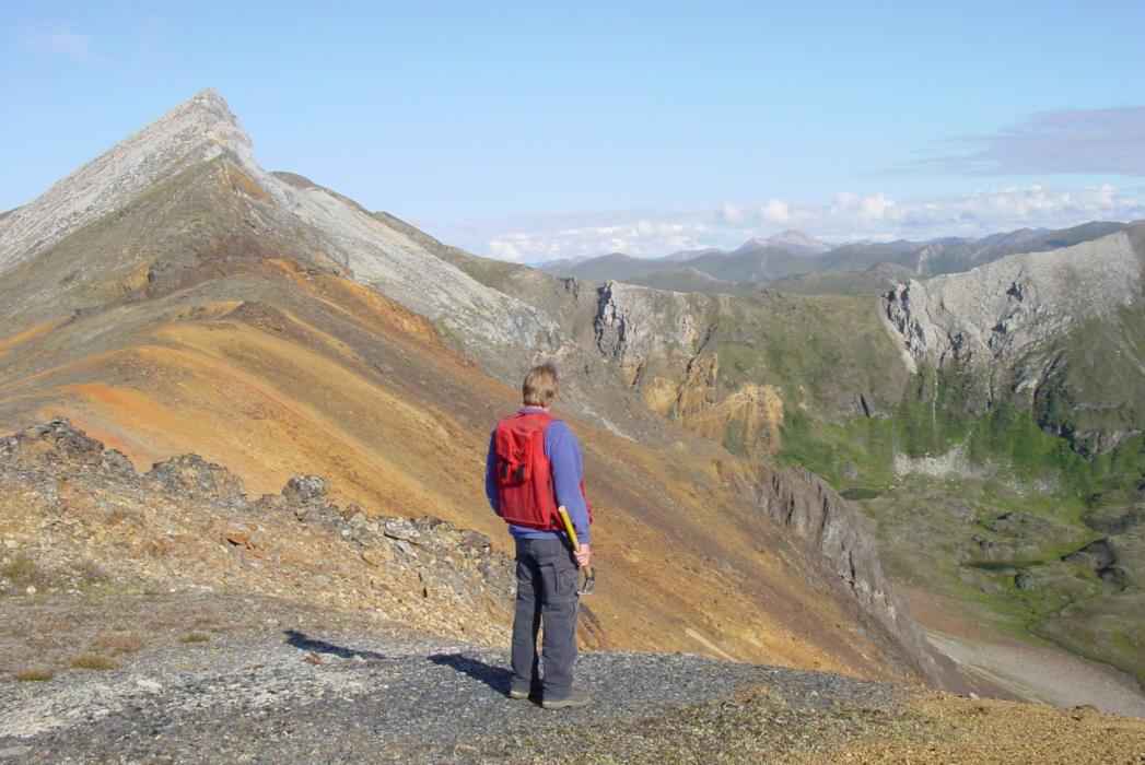 Gossanous ridge (Trachyte Dome with mineralized volcanic breccia) at the MM property