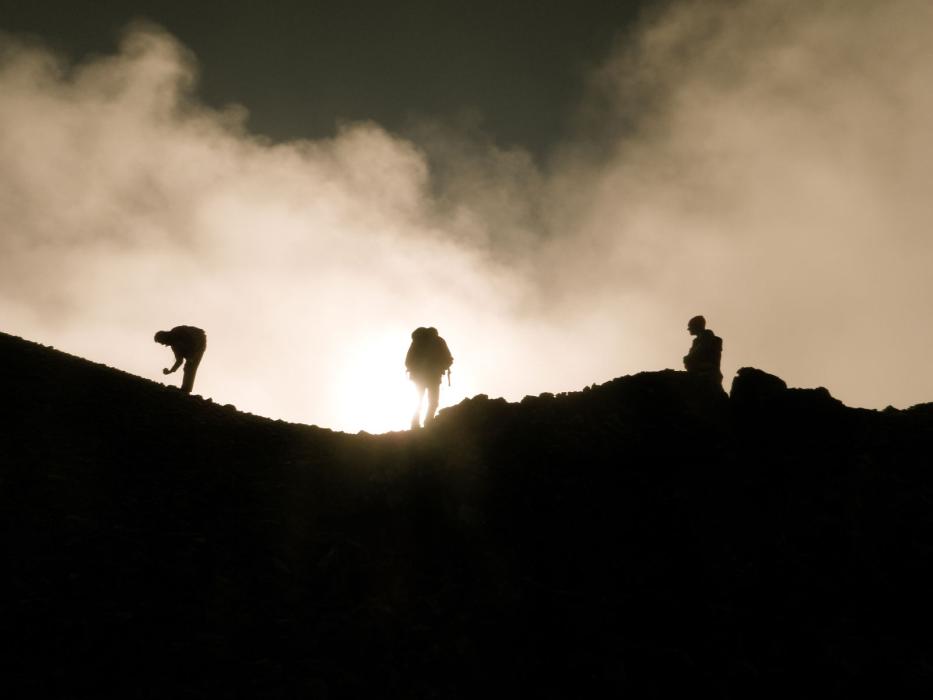 Exploration Geologists in the Field - Kalum Property - Hat Zone - Sampling on a misty ridge