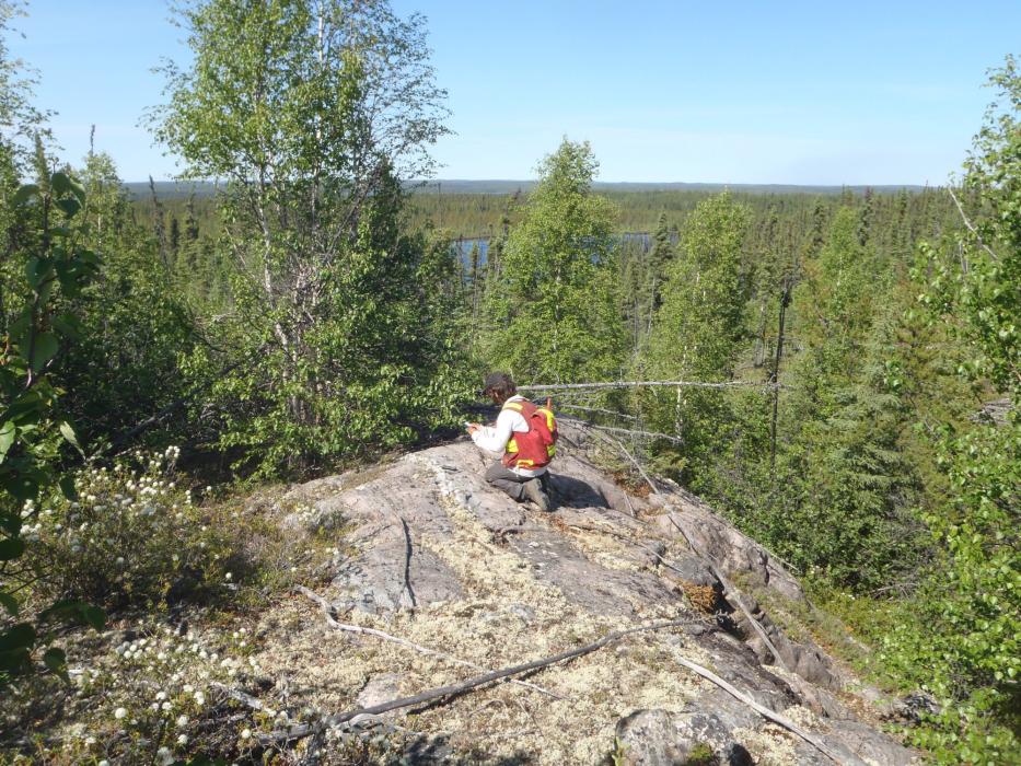 Geologist Exploring for Uranium on Traverse in Saskatchewan Geologist Exploring for Uranium on Traverse in Saskatchewan