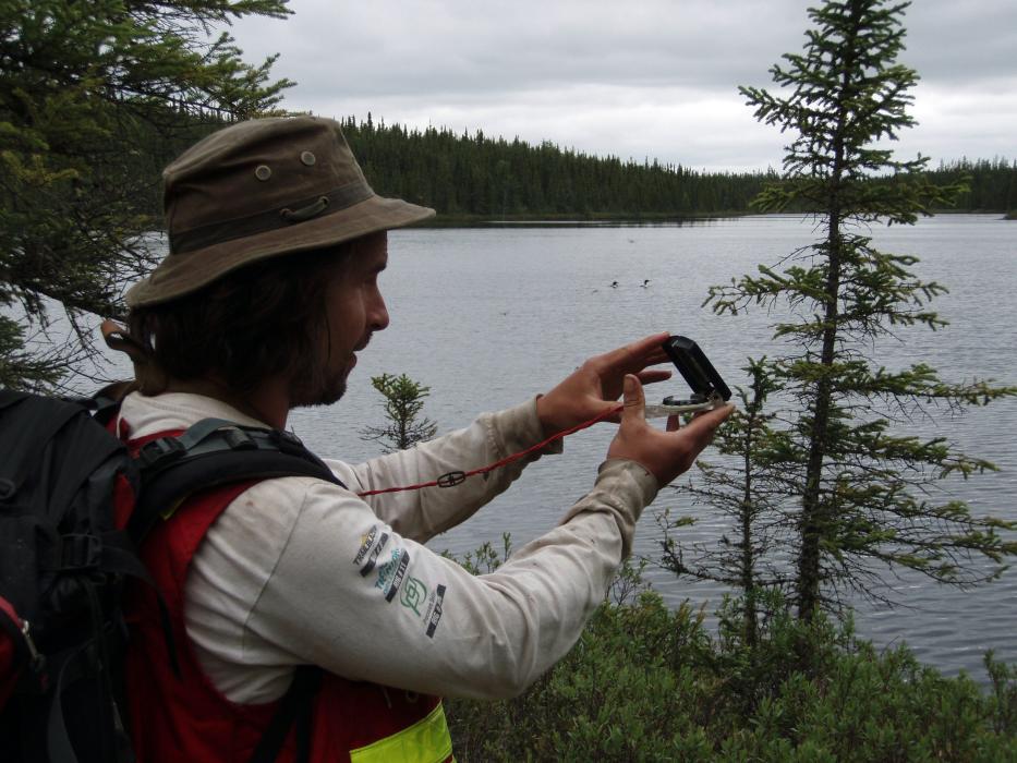 Taking a bearing during an exploration traverse