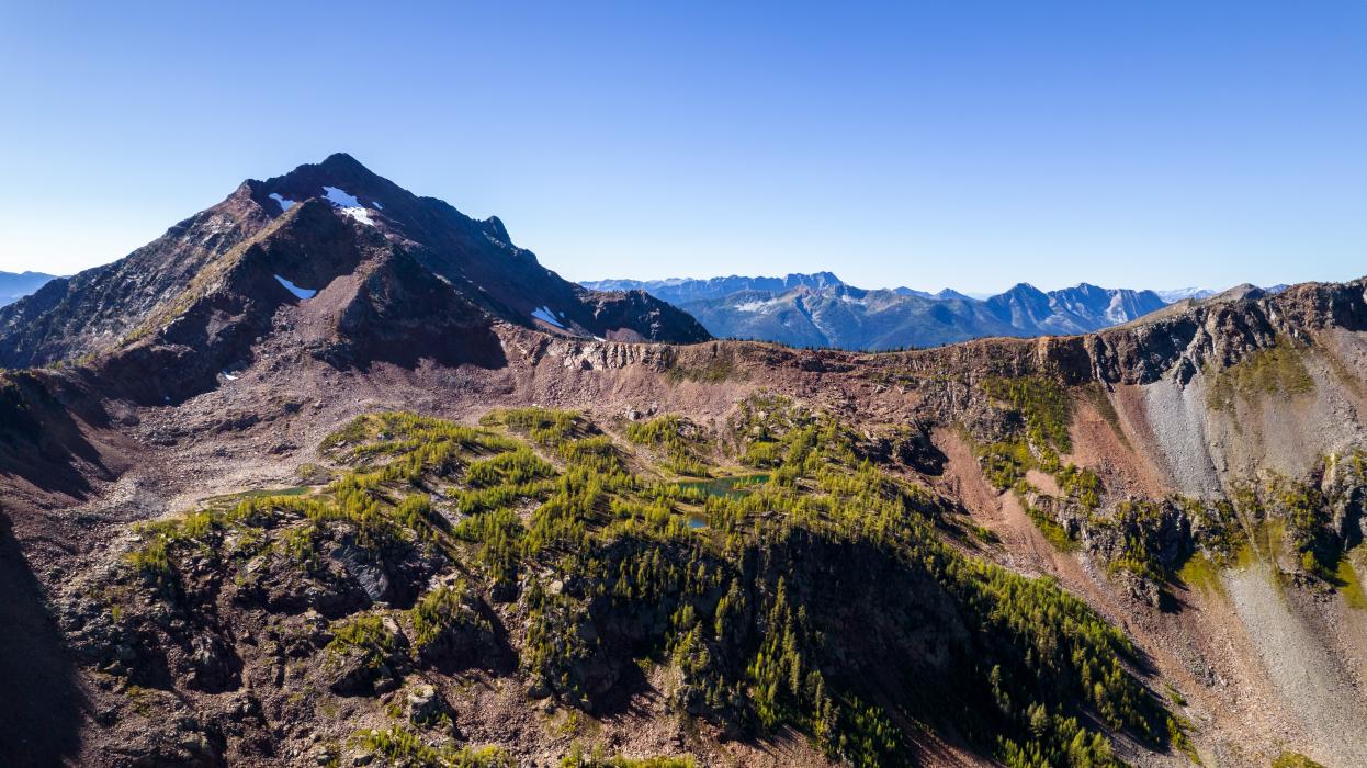 Purcell Mountain peaks 2022 View of Purcell Mountains from Vulcan Project in 2022